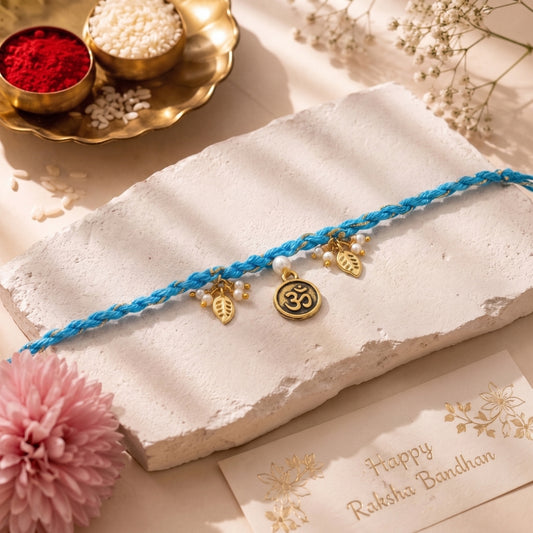 Om Leaf Charm Blue Braided Rakhi