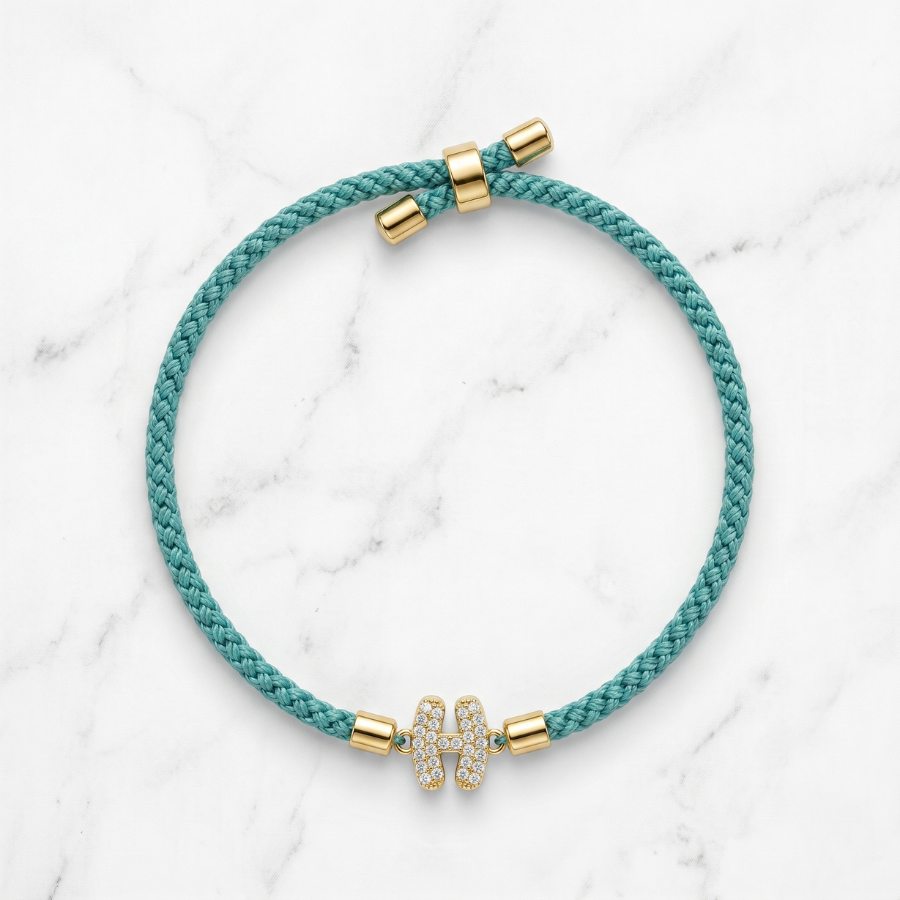 Signature H Rakhi