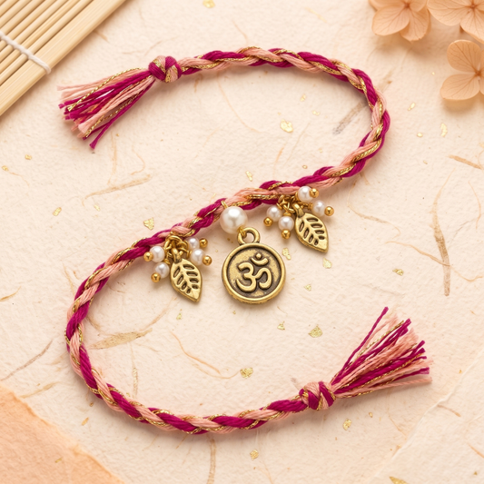 Dual Tone Om Charm Braided Rakhi