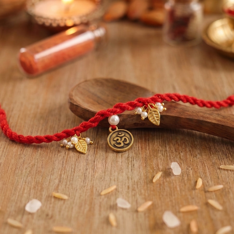 Red Om Charm Braided Rakhi