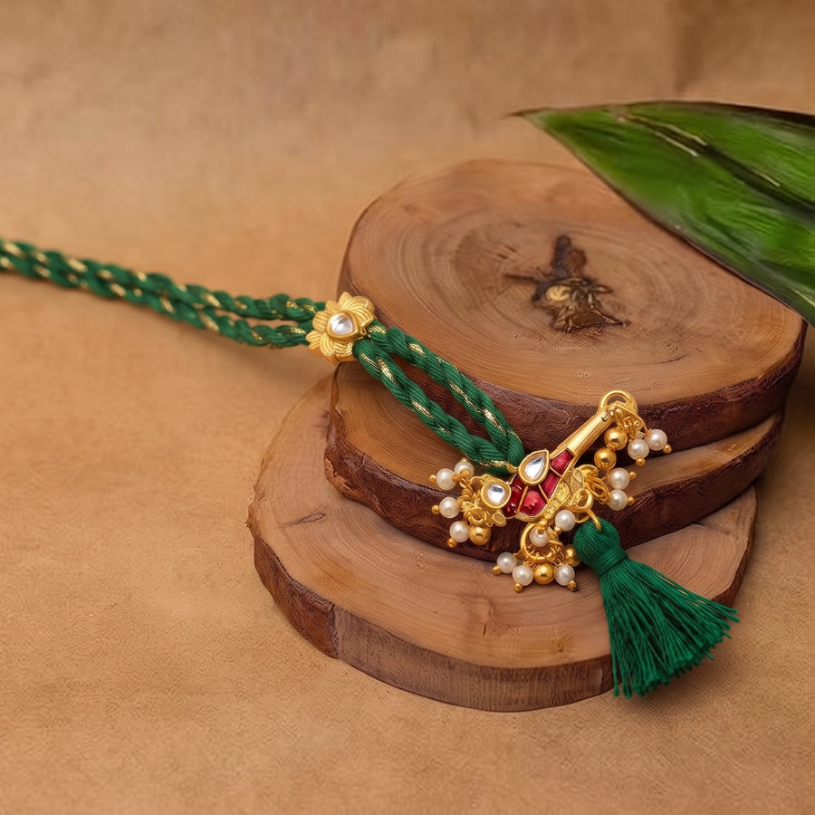 Flute Pearl Tassel Designer Lumba Rakhi